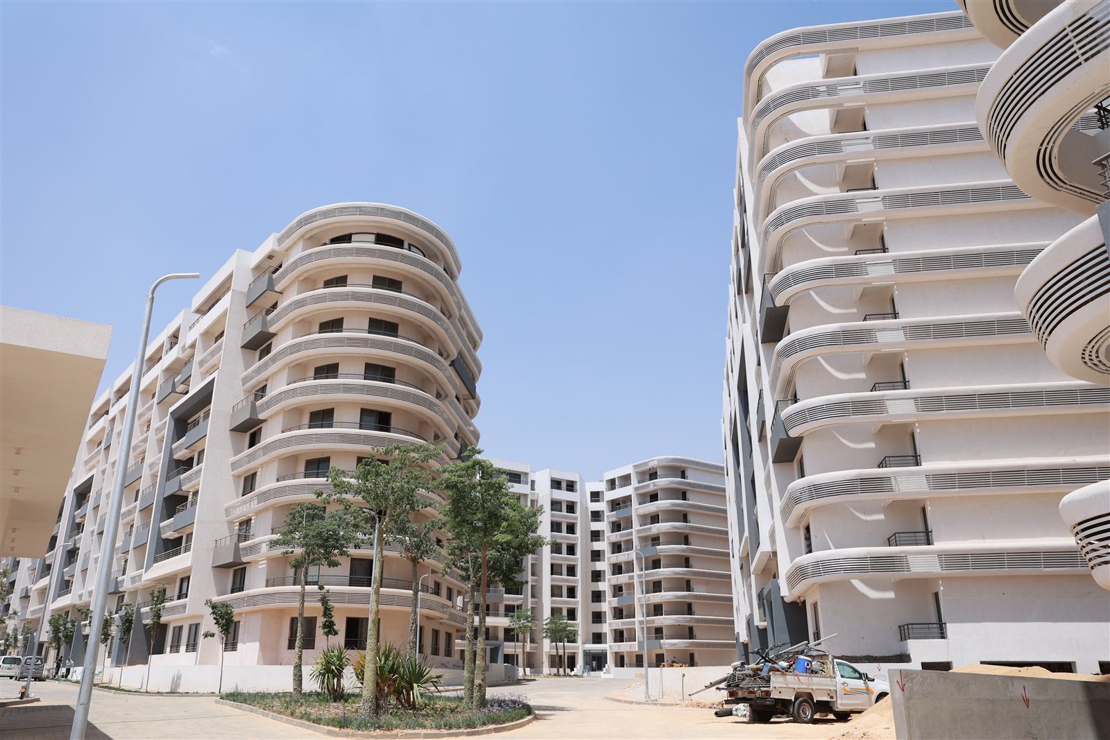 Street-level view between Boardwalk residential buildings, July 2026